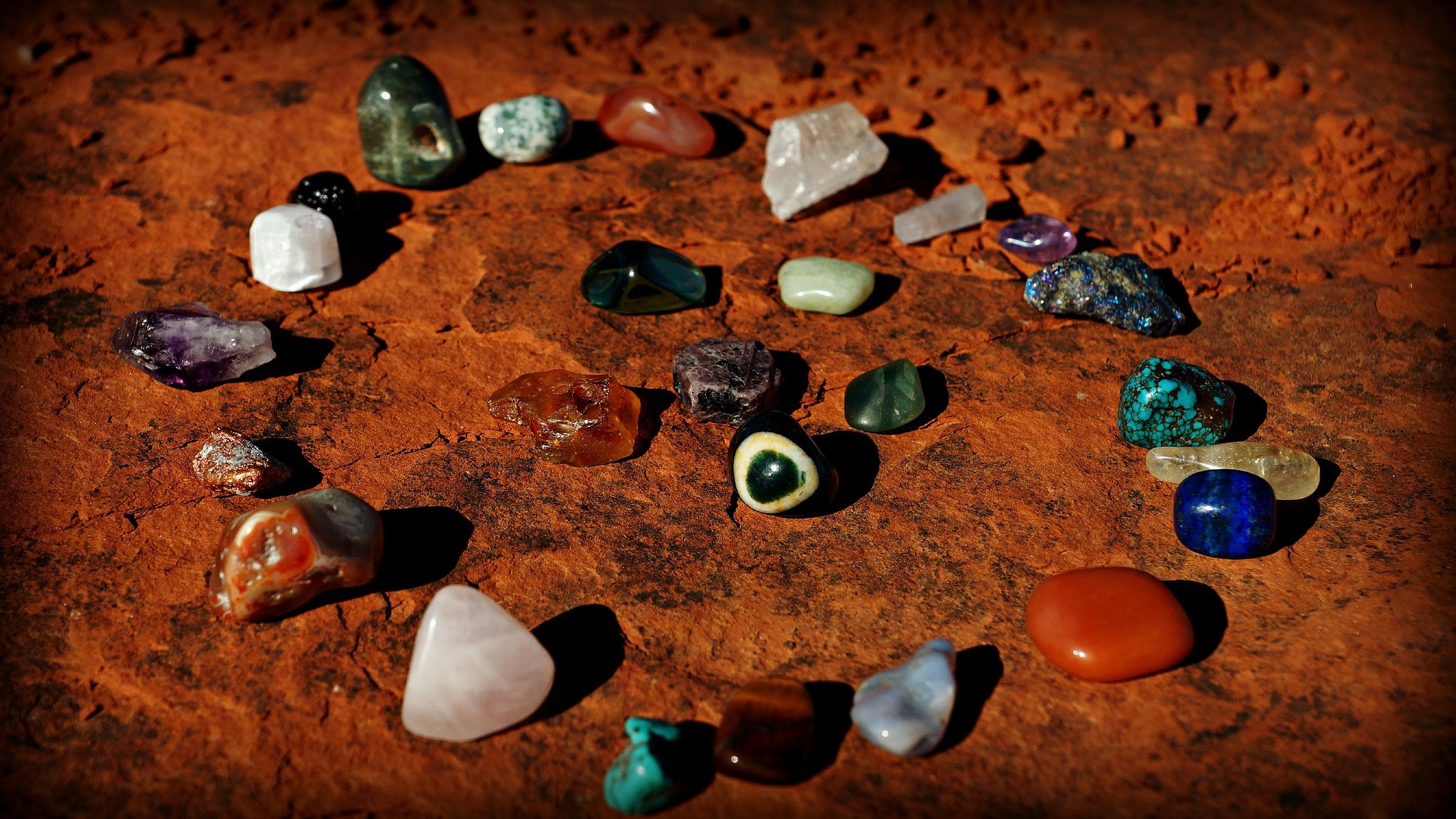 Crystal circle laid on Sedona red earth near a vortex site